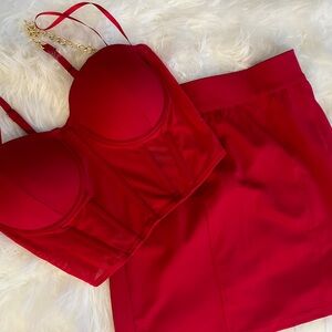Red corset top and skirt set with  chain detail
